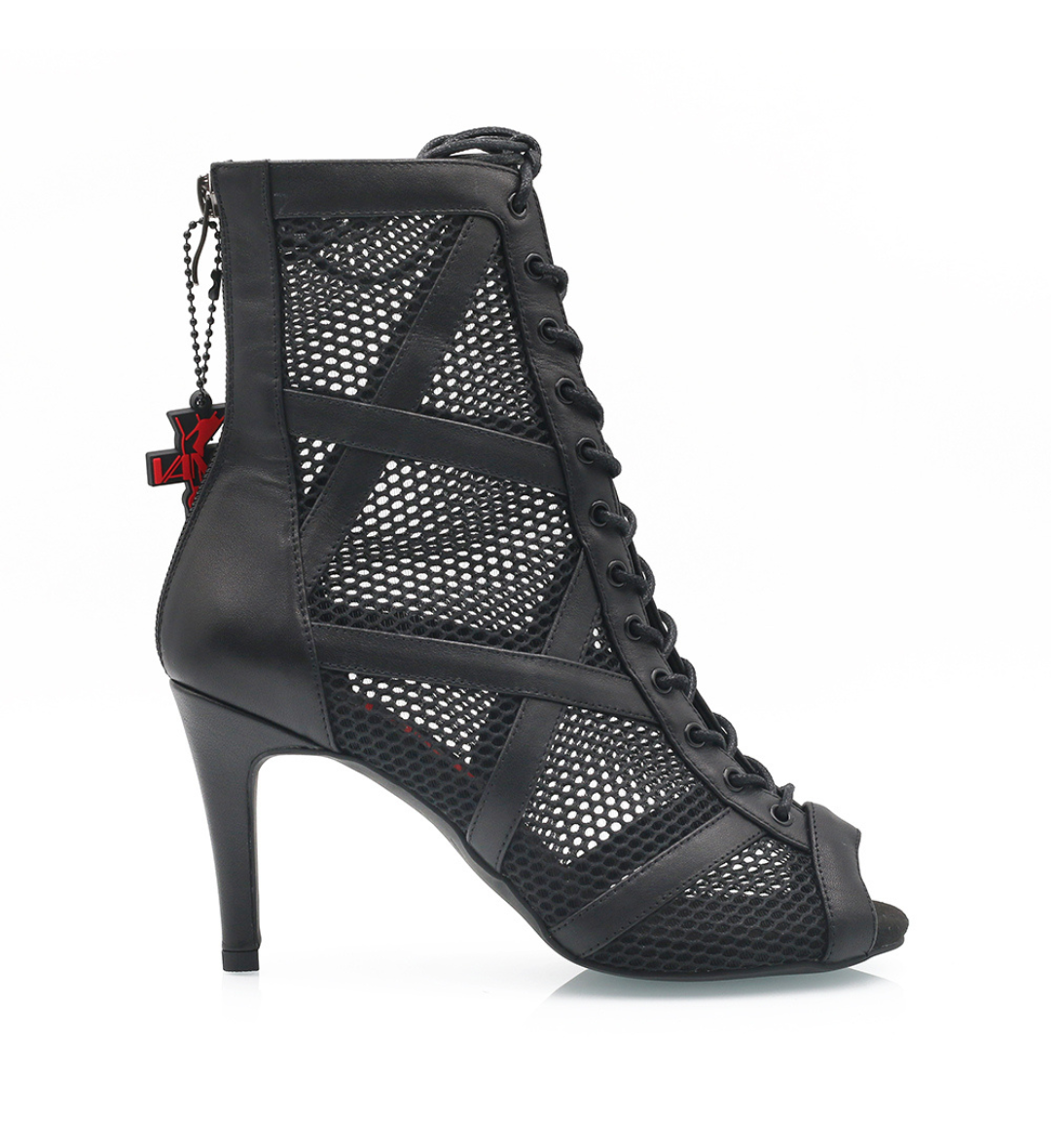 Black high-heeled shoe with mesh design and red accents on a white background