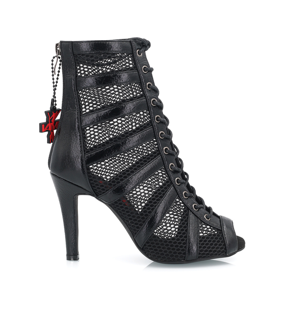 Black lace-up high-heeled shoe with chain detail on a white background